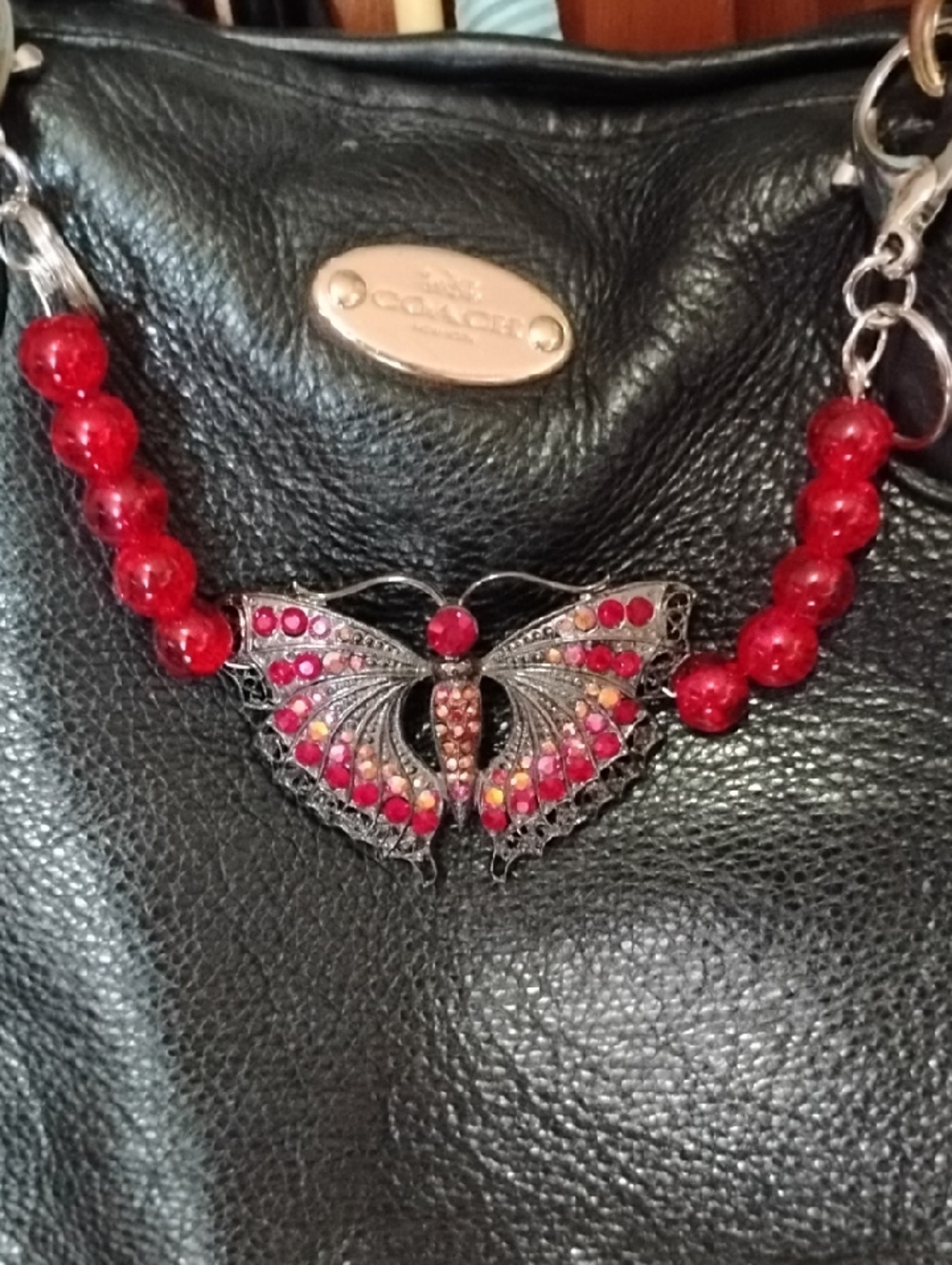 Red Beaded Butterfly Pendant Necklace by Coach